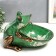 Souvenir Polystone stand "Frog with flowers" aged green 18x26 cm