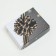 Box cover is a “tape”, without a window, 18 x 15 x 5 cm