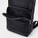 A backpack with a zipper, "saxi", outer pocket, black color