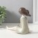 Polystone souvenir "Baby in a green polka dot dress" 19x9.5x14.5 cm