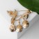 Berry brooch, blue-green color in gold