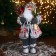 Santa Claus "In a white-red fur coat with a strap, with skis" 45 cm