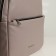 A backpack with a zipper, Textura, external pocket, gray-beige color