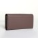 Women's wallet on a magnet, the color is pink-brown