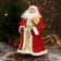 Santa Claus "in a red belted fur coat, with gifts" 45x23 cm