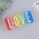 Tabalney "Love", 16.5 x 7.5 cm.