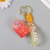 Trick rubber with carbine, strap "glass of lemonade" Water with glitter 4x6x6 cm