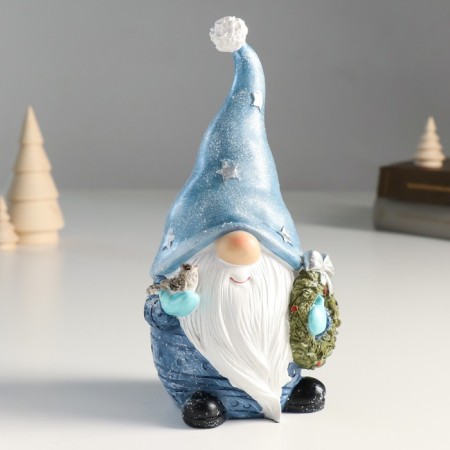 Polystone souvenir "Santa Claus in a cap with stars, with a wreath and a bird" 10x8.5x21 cm