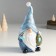 Polystone souvenir "Santa Claus in a cap with stars, with a wreath and a bird" 10x8.5x21 cm