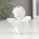 Polystone souvenir "Snowty Angel in a pink wreath sits" mix 6x3.5x4.9 cm