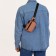 Women's sling bag from textiles, pink color