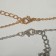 Kulons "Demetrons" Shock gesture, color silver-gold, l = 40 cm