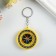 A keychain with a compass Round mix 4.5x4.5x1 cm