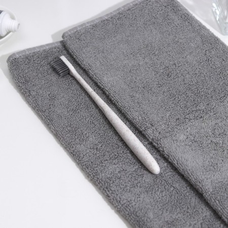 The toothbrush is soft, in the tube, white-1