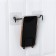 The holder is universal, 14 × 15 cm, the color is black