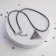 Piece on the lace "Eye RA", color black silver on a black lace, 44 cm