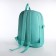 School set. A backpack with a zipper, a chover, bag, a pencil case, a bag for coins, the color is turquoise