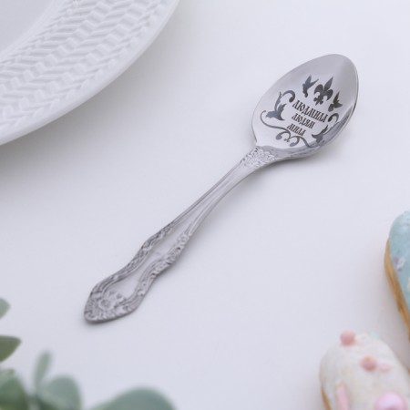 A spoon is registered, tea, with an engraving "Lyudmila", h = 14-1