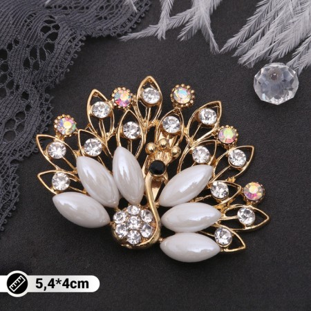 Brooch "Peacock" with a fluffy tail, white-radiant color in gold