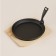 Cast iron pan on a wooden stand Sl Home, D = 22.5 cm, h = 2.5 cm, black color is black