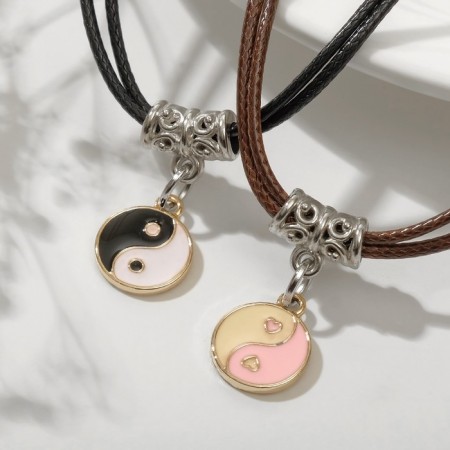 Kulons on the cord "Uzolnokhniki" yin-yang, color, 43 cm