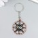 Metal keychain "Hot with a compass" 3.5x3.5 cm