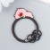 The keyboard-keyword metal "Pink pig sleeps" enamel 5.5x4.2 cm