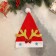 New Year's cap "Deer horns" with a bow and stars 25x35 cm
