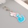 Acryl keychain "Snake in a knitted hat of a bunny" 6x3.6 cm