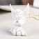 Suvenir Polystone "A Snowthrough Angel with a ball of rhinestones sits" mix 8x6x2.5 cm