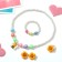 Set of children's “chosen” 4 subjects: clips, beads, bracelet, ring, bee, colored
