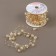 Pearls on a fishing line, 3/8 mm, 9 ± 0.5 m, gold color