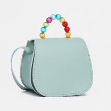 Baby bag on a magnet, the color is light turquoise