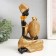 African Polystone souvenir sits with a wicker jug ​​"gold 23x13.5x10.3 cm