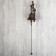 Souvenir metal bell "Bird on a branch" 24x12x7.5 cm