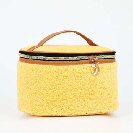 Cosmetic bag on lightning, with a lodge, yellow color