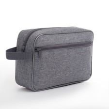 Cosmetic bag on a zipper, with a lining, external pocket, gray color