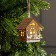Christmas tree toy "House with Santa Claus on the sled", from batteries, glow warm white