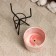 Kashpo "cylinder" pink, on a black stand, 13x8cm
