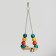 Bird swings with wooden gruel triangular, mix of flowers