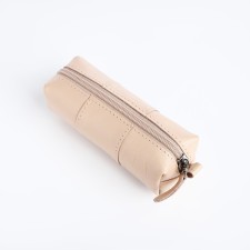 Key of zipper, length 12.5 cm, ring, beige color