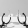 Emall earrings "cross" on the ring, matte black color