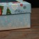 The box is folding, the lid is, with the “New Year's gift” window 24 x 17 x 8 cm