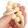 Silicone teether with a wooden ring, beige color, mum & baby