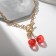 Piece "chain" Vishni branch, red color in gold, 45 cm
