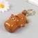A plastic keychain with a carbine "Hippo-Subastika" closes when you press a tooth 5.5x7.5x4.5 cm 104989