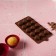 Form for sweets and chocolate of the “shells”, silicone, 20.5 × 10.5 cm, 15 cells (2.7 × 2.4 cm), brown color