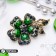 Brooch "Flower of desires", emerald color in black gold