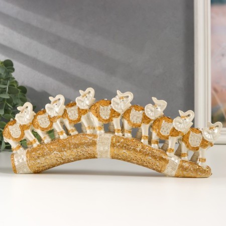 Polystone souvenir "Seven white elephants in golden blankets on a carved tusk" 11x3.5x28.5 cm