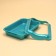 A medium toilet with an side and a mesh of 36 x 26 x 9 cm, tray+grid+side turquoise